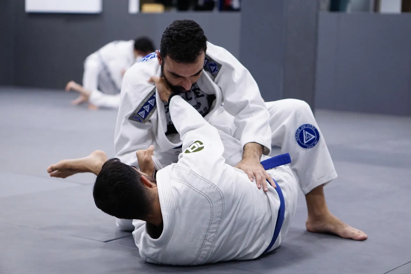 Adults rolling in the All Levels class